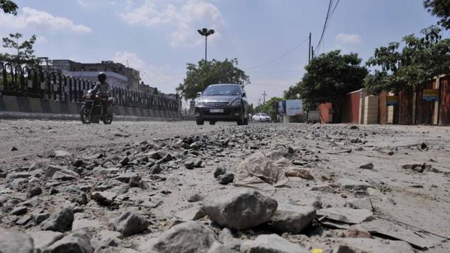 Driving on several stretches in the state capital can give jolts to commuters. (HT File Photo) Driving on several stretches in the state capital can give jolts to commuters. (HT File Photo)