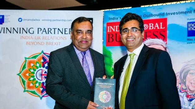 Indian high commissioner YK Sinha releasing the book Winning Partnership edited by Manoj Ladwa (right) in London on June 26, 2017.(HT Photo)