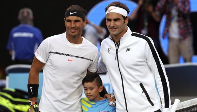 Spain's Rafael Nadal, left, and Switzerland's Roger Federer have won a Grand Slam in 2017. (AP) Spain's Rafael Nadal, left, and Switzerland's Roger Federer have won a Grand Slam in 2017. (AP)
