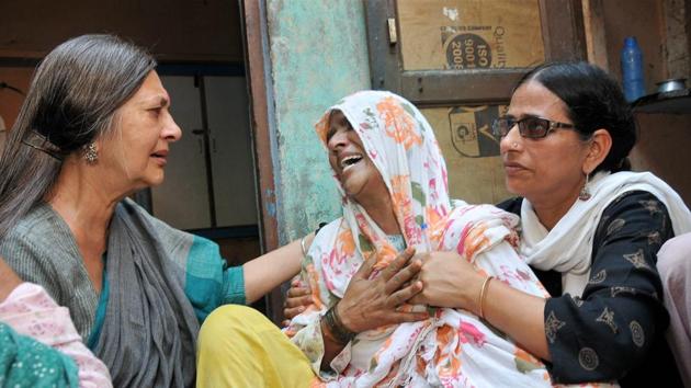 CPI(M) Polit Bureau member Brinda Karat consoling Zaira, Junaid’s mother, Haryana, June 24(PTI)