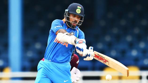 India's Shikhar Dhawan plays a shot during the second One-Day International (ODI) against the West Indies at the Queen's Park Oval in Port of Spain.(AFP)