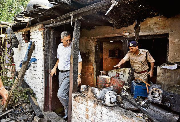 Two shanties in southeast Delhi’s Okhla were engulfed in the fire. At least nine people were rushed to the hospital after the incident. (Saumya Khandelwal/HT PHOTO) Two shanties in southeast Delhi’s Okhla were engulfed in the fire. At least nine people were rushed to the hospital after the incident. (Saumya Khandelwal/HT PHOTO)