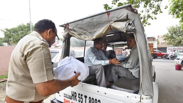 A team of health officials and CID go through the documents of a clinic it searched on Tuesday. (Top) all medicines, steroids and antibiotics at these clinics were seized.(Sanjeev Verma/HT PHOTO)