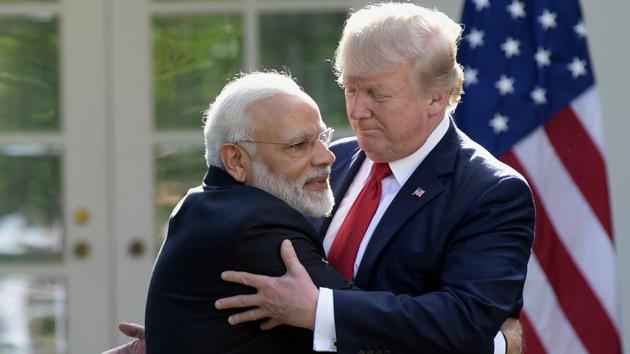 Prime Minister Narendra Modi and US President Donald Trump hug while making statements in the Rose Garden of the White House in Washington.(AP Photo) Prime Minister Narendra Modi and US President Donald Trump hug while making statements in the Rose Garden of the White House in Washington.(AP Photo)
