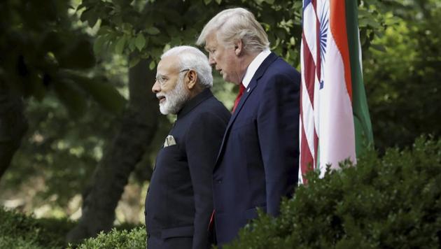 President Donald Trump walks to a joint statement in the Rose Garden with Indian Prime Minister Narendra Modi at the White House, Monday. (AP) President Donald Trump walks to a joint statement in the Rose Garden with Indian Prime Minister Narendra Modi at the White House, Monday. (AP)
