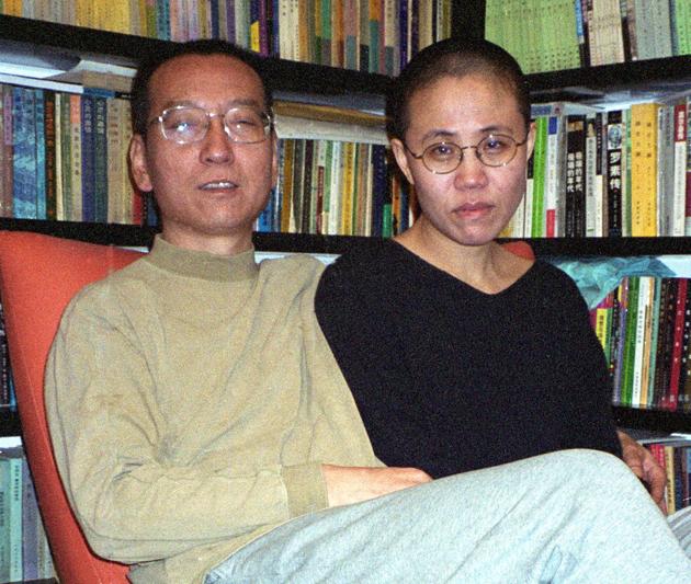 File photo of Chinese dissident and Nobel Peace laureate Liu Xiaobo (L) and his wife Liu Xia in Beijing. (AFP) File photo of Chinese dissident and Nobel Peace laureate Liu Xiaobo (L) and his wife Liu Xia in Beijing. (AFP)