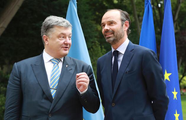 France's Prime Minister Edouard Philippe (on right) with Ukraine's president Petro Porochenko in Paris. (AFP) France's Prime Minister Edouard Philippe (on right) with Ukraine's president Petro Porochenko in Paris. (AFP)