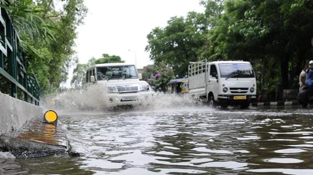 The road dividing Sector 6970 was inundated after heavy showers last week(HT Photo) The road dividing Sector 6970 was inundated after heavy showers last week(HT Photo)