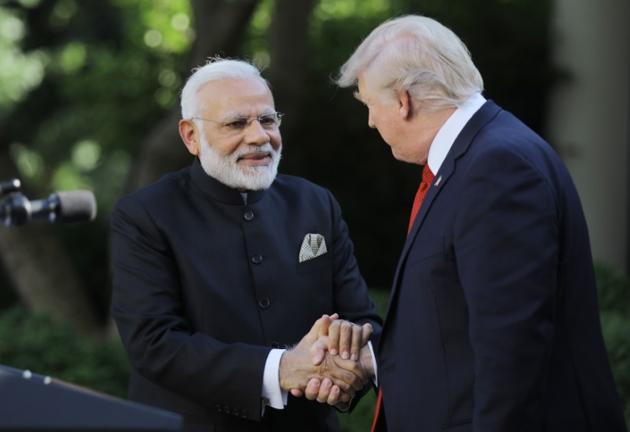 US President Donald Trump (R) greets Indian Prime Minister Narendra Modi during their joint news conference in the Rose Garden of the White House in Washington. (Reuters) US President Donald Trump (R) greets Indian Prime Minister Narendra Modi during their joint news conference in the Rose Garden of the White House in Washington. (Reuters)