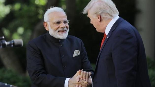 US President Donald Trump (R) greets Indian Prime Minister Narendra Modi during their joint news conference in the Rose Garden of the White House in Washington. (Reuters) US President Donald Trump (R) greets Indian Prime Minister Narendra Modi during their joint news conference in the Rose Garden of the White House in Washington. (Reuters)