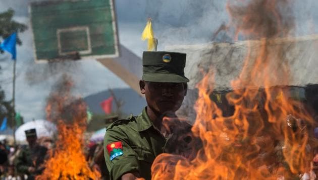 Myanmar police stand near the site where confiscated drugs were burnt to commemorate World Anti-Drugs Day on the outskirts of Yangon on June 26, 2017. Myanmar and Thailand torched nearly $1 billion worth of seized narcotics, a defiant show of force as law enforcement struggles to stem the rising flow of drugs in the region. (AFP) Myanmar police stand near the site where confiscated drugs were burnt to commemorate World Anti-Drugs Day on the outskirts of Yangon on June 26, 2017. Myanmar and Thailand torched nearly $1 billion worth of seized narcotics, a defiant show of force as law enforcement struggles to stem the rising flow of drugs in the region. (AFP)
