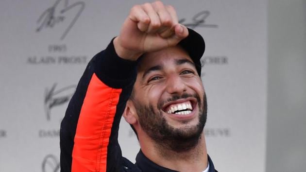 Daniel Ricciardo celebrates after winning the Formula One Azerbaijan Grand Prix.(AFP)