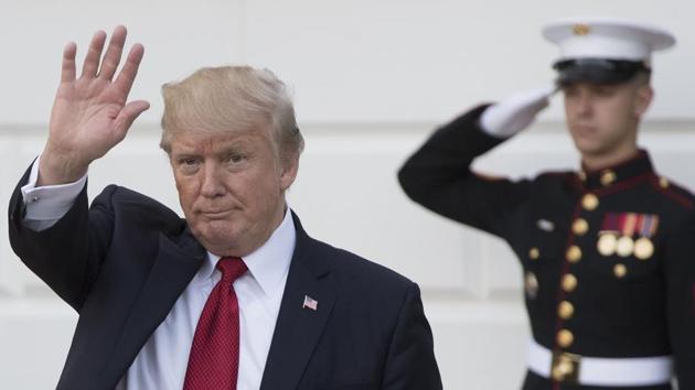 Trump waves to the press after escorting Modi to his car on the South Lawn of the White House following meetings and dinner. Trump said the relationship between India and the US has never been stronger and better. (Saul Leab/AFP) Trump waves to the press after escorting Modi to his car on the South Lawn of the White House following meetings and dinner. Trump said the relationship between India and the US has never been stronger and better. (Saul Leab/AFP)