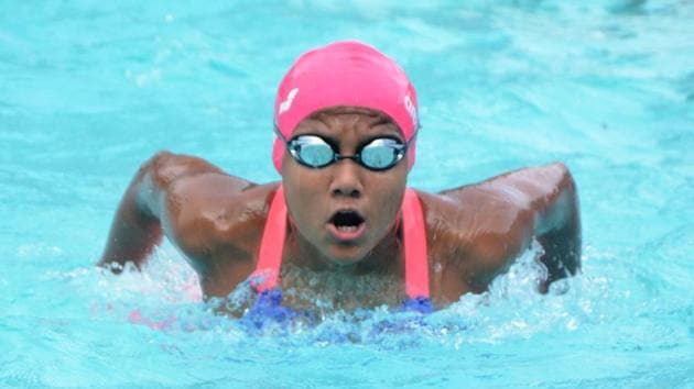 Sanjiti Saha set a national record in the 100m butterfly event.(HT Photo)