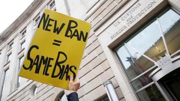 Immigration activists, including members of the DC Justice for Muslims Coalition, rally against the Trump administration’s ban against travellers from six Muslim-majority nations, outside of the US Customs and Border Protection headquarters in Washington, in March 2017. (Reuters File Photo) Immigration activists, including members of the DC Justice for Muslims Coalition, rally against the Trump administration’s ban against travellers from six Muslim-majority nations, outside of the US Customs and Border Protection headquarters in Washington, in March 2017. (Reuters File Photo)