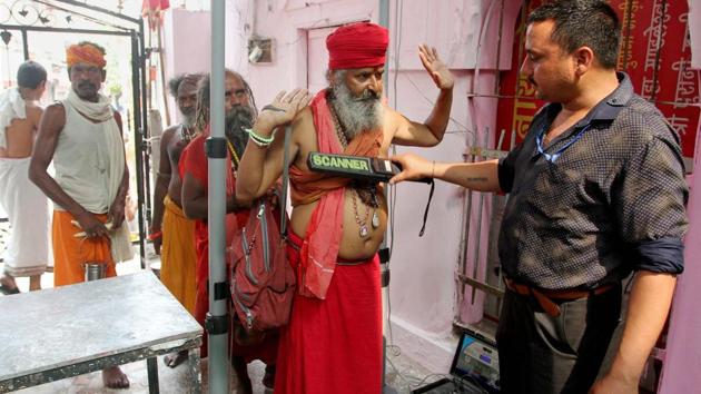 Sadhus undergo a security check before getting registered for the annual Amarnath Yatra at Ram Mandir base camp in Jammu. The first batch of Amarnath pilgrims left here for the cave shrine in the Kashmir Valley amid extraordinary security arrangements. The 40-day yatra will culminate on August 7 on Raksha Bandhan. There are two routes: the traditional 28.2 km long Pahalgam route in Anantnag district, while the Baltal track in Ganderbal district is a 9.5 km-stretch. (PTI)