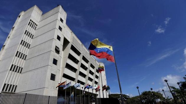A man walks in front of a building of the Venezuela Supreme Court in Caracas. (Reuters File Photo) A man walks in front of a building of the Venezuela Supreme Court in Caracas. (Reuters File Photo)
