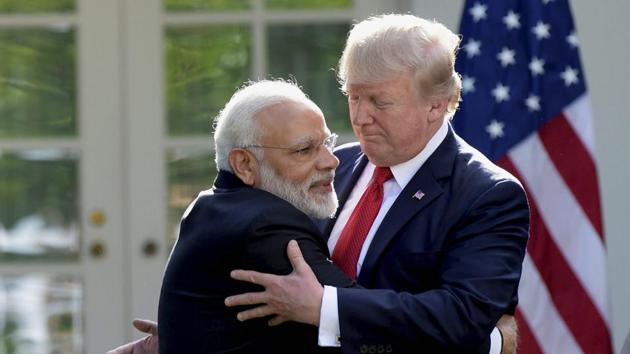 President Donald Trump and Indian Prime Minister Narendra Modi hug while making statements in the Rose Garden of the White House in Washington.(AP Photo)