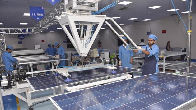 According to CEL officials, the solar plant has a capacity to produce nearly 300 solar panels of 300 watts each in a single day. (Sakib Ali/HT Photo) According to CEL officials, the solar plant has a capacity to produce nearly 300 solar panels of 300 watts each in a single day. (Sakib Ali/HT Photo)