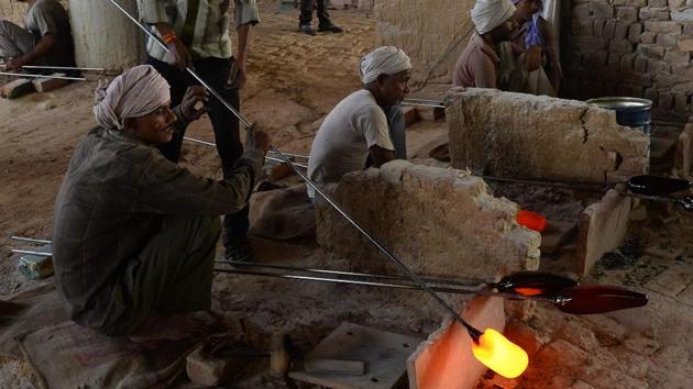 A 2015 joint study by Indian and US researchers concluded smog from burning fossil fuels, dung and garbage in and around Agra city was tarnishing the marble. Although mud packs are applied periodically to draw the stain from the stone, but authorities have struggled to rope in the discolouration. (Sajjad Hussain /AFP) A 2015 joint study by Indian and US researchers concluded smog from burning fossil fuels, dung and garbage in and around Agra city was tarnishing the marble. Although mud packs are applied periodically to draw the stain from the stone, but authorities have struggled to rope in the discolouration. (Sajjad Hussain /AFP)