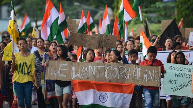 Supporters of the Gorkha Janamukti Morcha during a protest rally in support of a separate Gorkhaland state. (AFP File) Supporters of the Gorkha Janamukti Morcha during a protest rally in support of a separate Gorkhaland state. (AFP File)