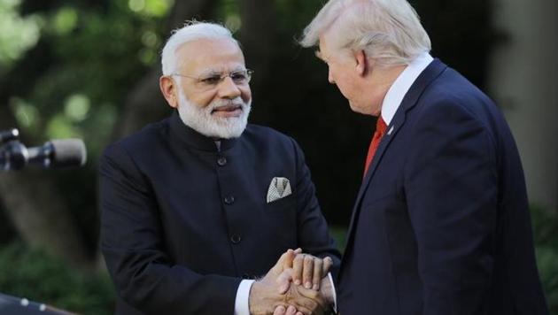 US President Donald Trump (R) greets Indian Prime Minister Narendra Modi during their joint news conference in the Rose Garden of the White House in Washington. (Reuters) US President Donald Trump (R) greets Indian Prime Minister Narendra Modi during their joint news conference in the Rose Garden of the White House in Washington. (Reuters)
