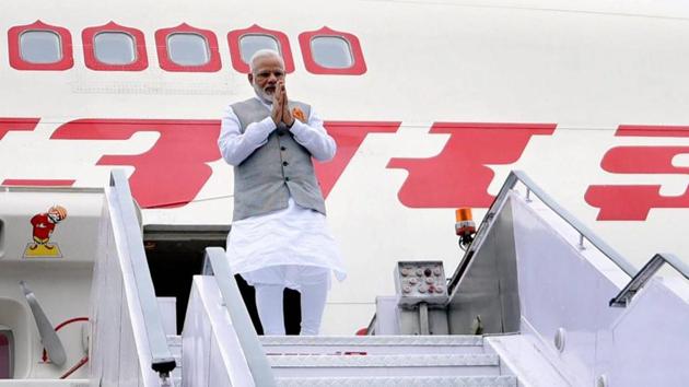 PM Modi on his arrival after a successful visit to Portugal, USA and Netherlands, at AFS Palam in New Delhi. (PTI Photo)