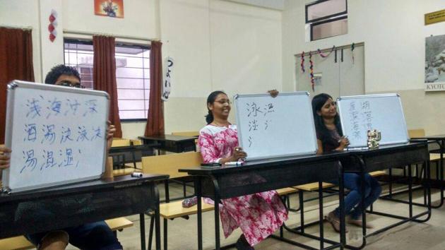 Students learning Japanese in a classroom in Pune.(HT PHOTO)
