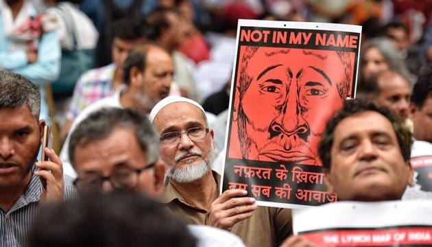 Protesters hold placards in support of the campaign, ‘Not In My Name’, at Jantar Mantar in New Delhi. Facebook post by a filmmaker against the lynching of a Muslim teenager has sparked a powerful online campaign, leading to protest marches being organised in several cities across the country. (Raj K Raj / HT Phot’) Protesters hold placards in support of the campaign, ‘Not In My Name’, at Jantar Mantar in New Delhi. Facebook post by a filmmaker against the lynching of a Muslim teenager has sparked a powerful online campaign, leading to protest marches being organised in several cities across the country. (Raj K Raj / HT Phot’)