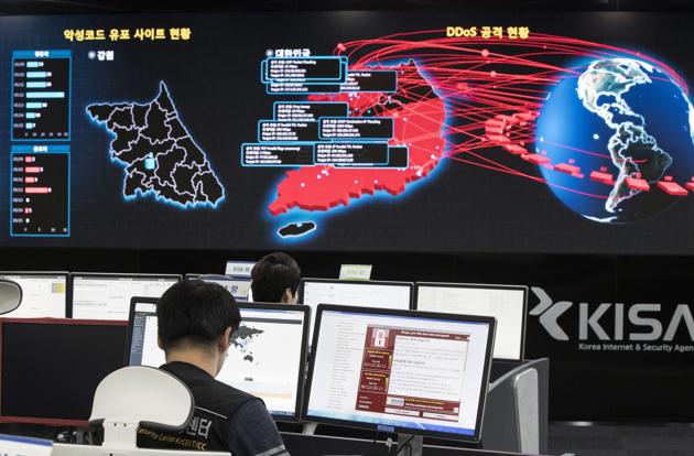 Employees watch electronic boards to monitor possible ransomware cyberattacks at the Korea Internet and Security Agency in Seoul, South Korea on May 15, 2017 (AP File Photo) Employees watch electronic boards to monitor possible ransomware cyberattacks at the Korea Internet and Security Agency in Seoul, South Korea on May 15, 2017 (AP File Photo)
