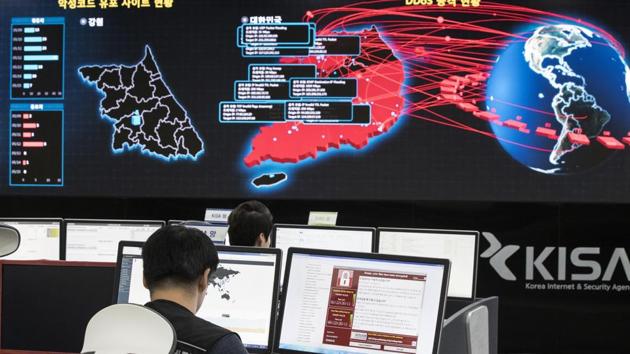 In this Monday, May 15, 2017, file photo, employees watch electronic boards to monitor possible ransomware cyberattacks at the Korea Internet and Security Agency in Seoul, South Korea. (AP Photo) In this Monday, May 15, 2017, file photo, employees watch electronic boards to monitor possible ransomware cyberattacks at the Korea Internet and Security Agency in Seoul, South Korea. (AP Photo)