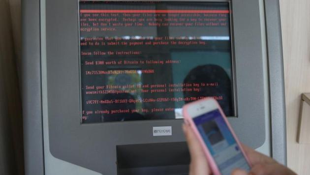 A message demanding money is seen on a monitor of a payment terminal at a branch of Ukraine's state-owned bank Oschadbank after Ukrainian institutions were hit by a wave of cyber attacks earlier in the day, in Kiev, Ukraine, on June 27, 2017. (Reuters Photo) A message demanding money is seen on a monitor of a payment terminal at a branch of Ukraine's state-owned bank Oschadbank after Ukrainian institutions were hit by a wave of cyber attacks earlier in the day, in Kiev, Ukraine, on June 27, 2017. (Reuters Photo)