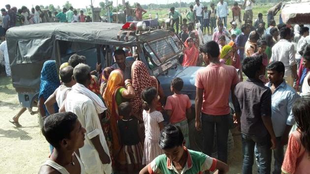 Police at Sitamarhi village where two men forced their mother to drink human excreta (HT photo) Police at Sitamarhi village where two men forced their mother to drink human excreta (HT photo)