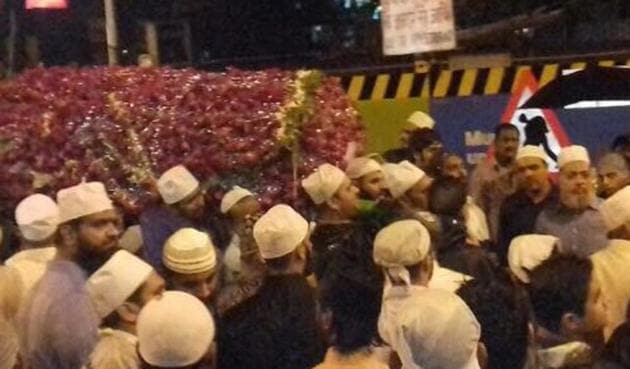The body being carried at Mumbai Central. (Bhushan Koyande) The body being carried at Mumbai Central. (Bhushan Koyande)