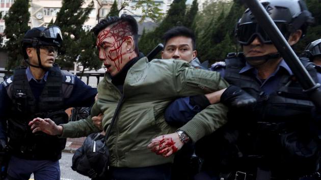 Since the return to China there are now concerns Beijing is trampling the agreement by interfering in a range of areas, from politics to education and media. (Bobby Yip /Reuters) Since the return to China there are now concerns Beijing is trampling the agreement by interfering in a range of areas, from politics to education and media. (Bobby Yip /Reuters)