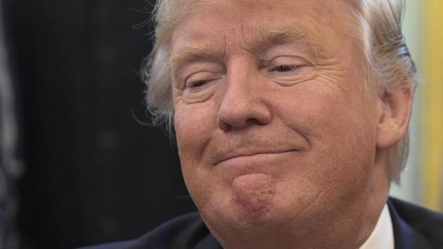 President Donald Trump pauses as he is asked a question if he would work with all 100 senators on health care during a meeting with the 2016 World Series Champions Chicago Cubs in the Oval Office of the White House in Washington. (AP) President Donald Trump pauses as he is asked a question if he would work with all 100 senators on health care during a meeting with the 2016 World Series Champions Chicago Cubs in the Oval Office of the White House in Washington. (AP)