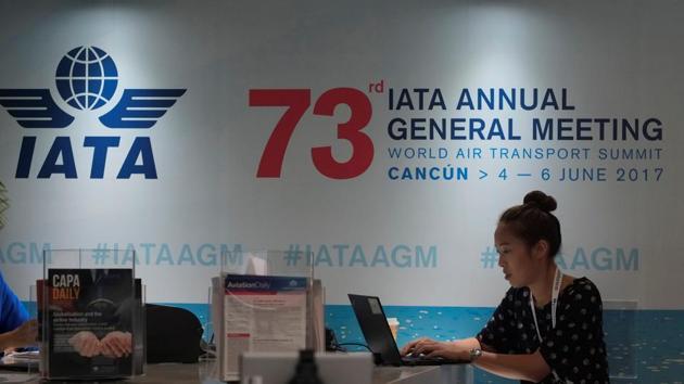 A woman uses a laptop at a meeting of the International Air Transport Association (IATA) in Cancun, Mexico.(REUTERS)