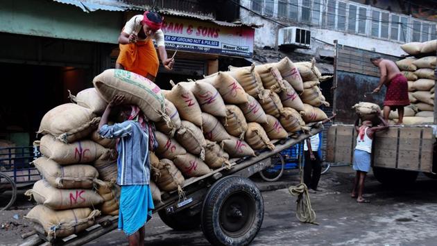 It took the government more than a decade to get the GST bill through the parliament amid political opposition over its particulars. This splintering resulted in four tax slabs instead of one as originally envisioned. (Dibyangshu Sarkar / AFP) It took the government more than a decade to get the GST bill through the parliament amid political opposition over its particulars. This splintering resulted in four tax slabs instead of one as originally envisioned. (Dibyangshu Sarkar / AFP)