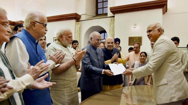Ram Nath Kovind files nomination papers for the Presidential election, in the presence of Prime Minister Narendra Modi and other dignitaries at the Parliament on June 23, 2017. (PTI) Ram Nath Kovind files nomination papers for the Presidential election, in the presence of Prime Minister Narendra Modi and other dignitaries at the Parliament on June 23, 2017. (PTI)