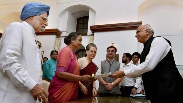 Meira Kumar files her nomination papers in the presence of former Prime Minister Manmohan Singh and Congress President Sonia Gandhi at Parliament House on June 28, 2017 . (Atul Yadav/PTI) Meira Kumar files her nomination papers in the presence of former Prime Minister Manmohan Singh and Congress President Sonia Gandhi at Parliament House on June 28, 2017 . (Atul Yadav/PTI)