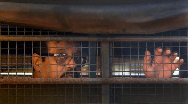 File photo of Mustafa Dossa being taken to the special TADA court. (PTI) File photo of Mustafa Dossa being taken to the special TADA court. (PTI)