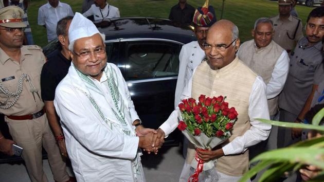 Bihar Chief Minister Nitish Kumar exchanges greetings with the then state governor Ram Nath Kovind at an Iftaar party in Patna, Bihar on June 17, 2017 . (PTI) Bihar Chief Minister Nitish Kumar exchanges greetings with the then state governor Ram Nath Kovind at an Iftaar party in Patna, Bihar on June 17, 2017 . (PTI)