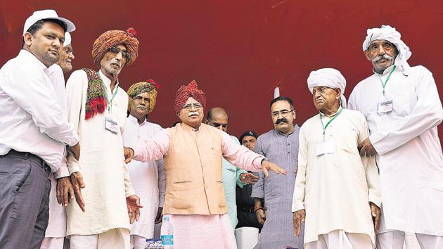 Chief minister Manohar Lal Khattar (centre) was in the city on Thursday to launch a plantation drive. As part of the drive, he planted saplings at Saraswati Kunj Society in Sector 53. (Sanjeev Verma/HT Photo) Chief minister Manohar Lal Khattar (centre) was in the city on Thursday to launch a plantation drive. As part of the drive, he planted saplings at Saraswati Kunj Society in Sector 53. (Sanjeev Verma/HT Photo)