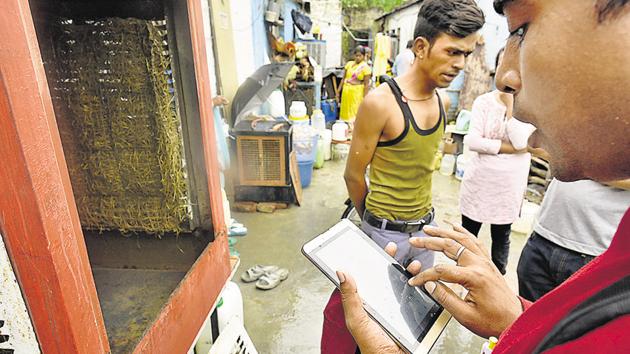 Workers from SDMC’s malaria department use a tablet to note down information at Kishangarh village near Vasant Kunj in New Delhi on Friday.(Vipin Kumar/HT File Photo) Workers from SDMC’s malaria department use a tablet to note down information at Kishangarh village near Vasant Kunj in New Delhi on Friday.(Vipin Kumar/HT File Photo)