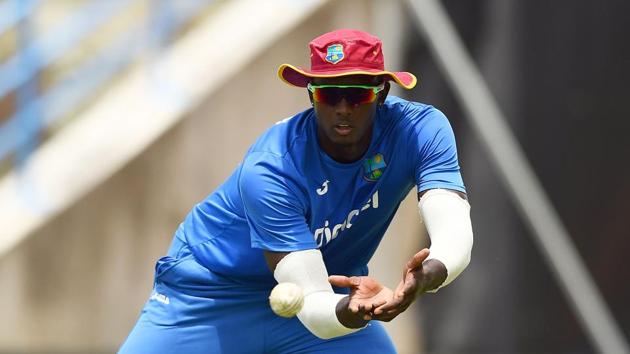 West Indies' captain Jason Holder catches a ball during practice. (AFP)