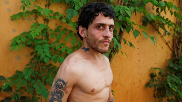 Jockey Mohammad Hassan poses for a photograph at the 100 year old Beirut Hippodrome. (Jamal Saidi/REUTERS) Jockey Mohammad Hassan poses for a photograph at the 100 year old Beirut Hippodrome. (Jamal Saidi/REUTERS)