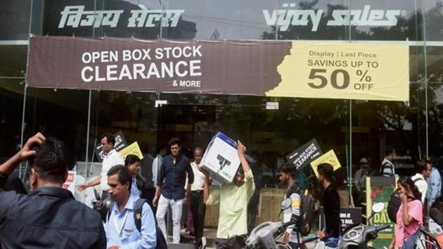 Garment stores were offering steep discounts on Friday to clear inventory before GST launch. (PTI Photo) Garment stores were offering steep discounts on Friday to clear inventory before GST launch. (PTI Photo)