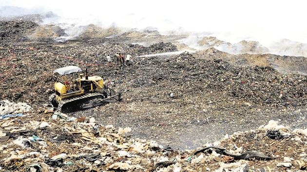 Phursungi villagers have carried out protests over this garbage dumping in their area, but the administration is yet to resolve the issue.(HT PHOTO)