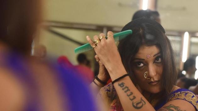 (A bold make-up, especially of the eyes and hair forms a big part of preparation for the performance. (Pratham Gokhale/HT Photo))