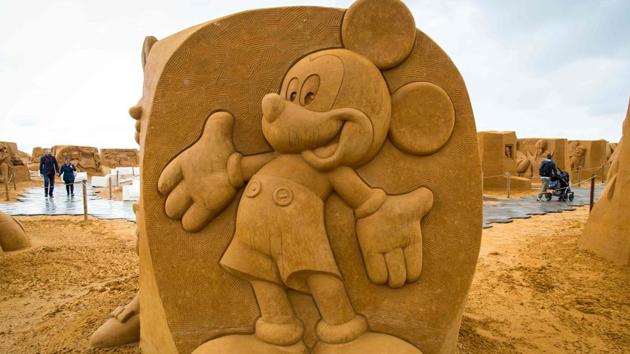 Photos: Sand sculpture brings Disney characters to Belgian beach